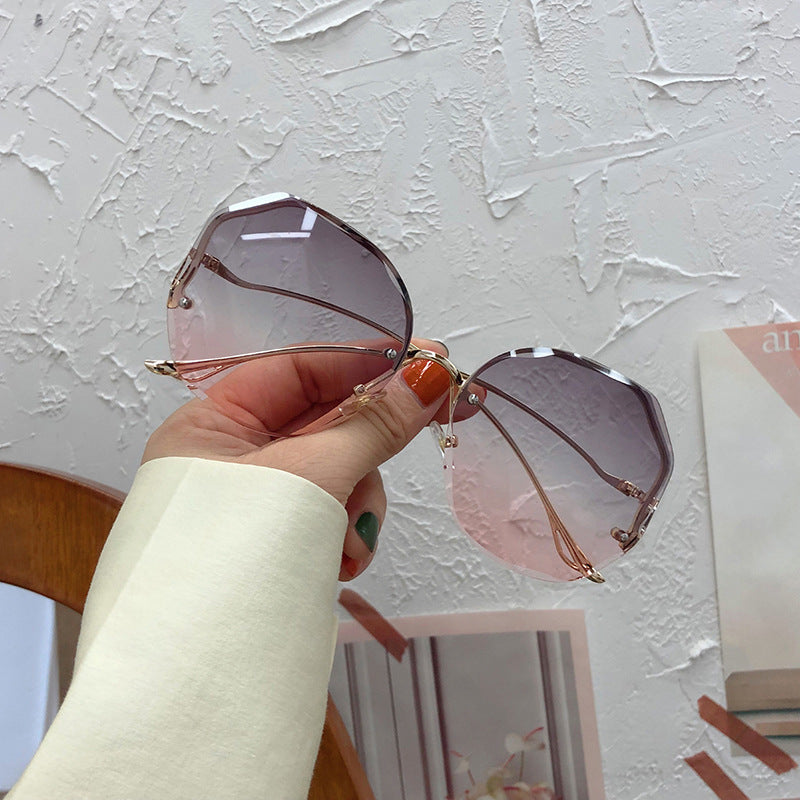 New Frameless Crystal Cut Edge Curved Leg Sunglasses Women