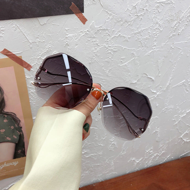 New Frameless Crystal Cut Edge Curved Leg Sunglasses Women
