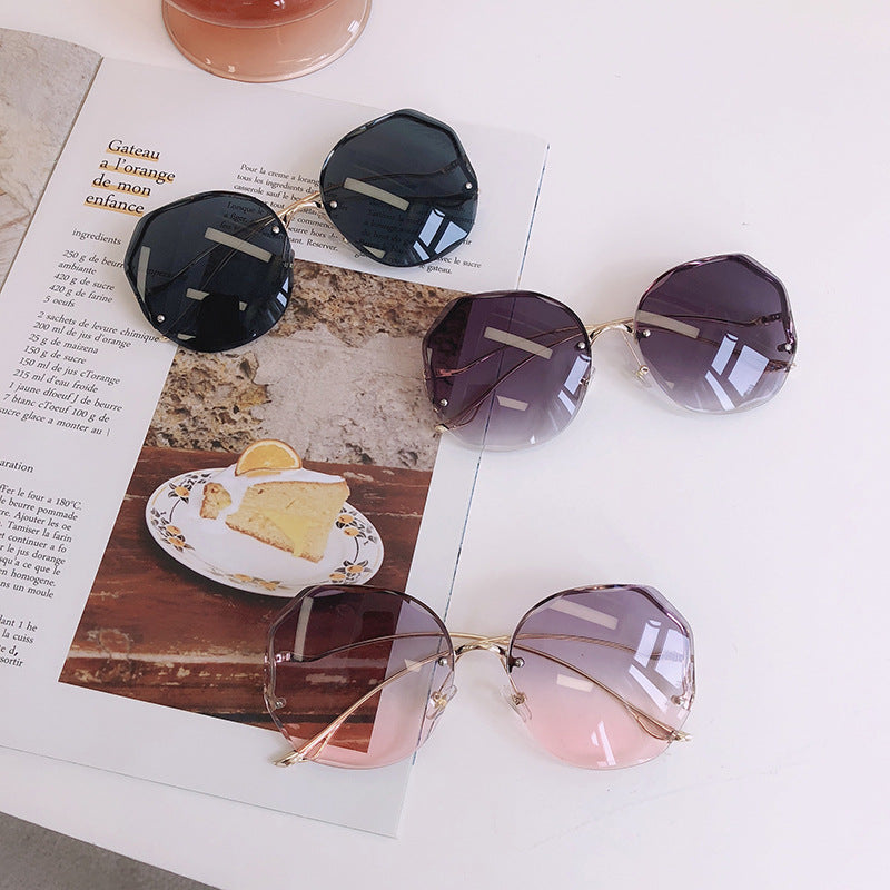 New Frameless Crystal Cut Edge Curved Leg Sunglasses Women
