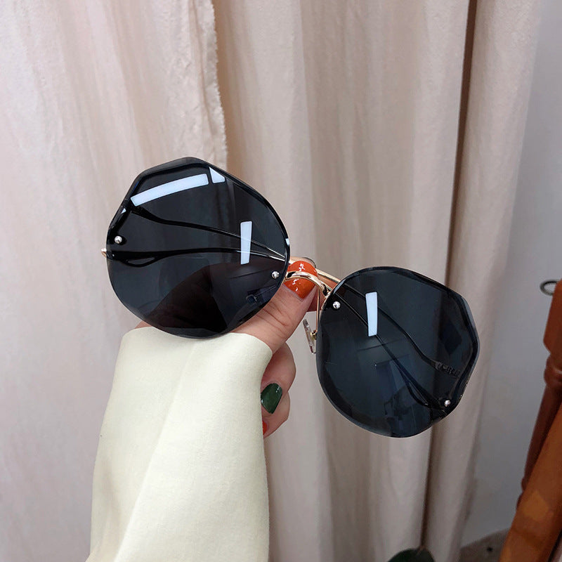 New Frameless Crystal Cut Edge Curved Leg Sunglasses Women